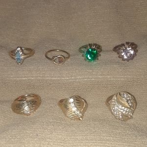 Assortment of 7 gold plated rings